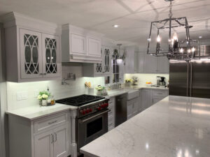 Modern kitchen with task, recessed, undercabinet and hanging lights